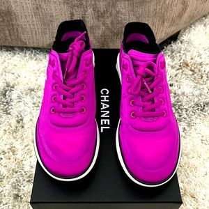 Women’s Purple Chanel Sneakers size 41..10 in women.Used but in great Condition